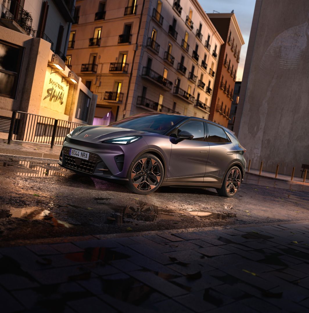 CUPRA Raval electric car front three-quarter view against a graffiti-style Raval backdrop.